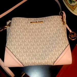 Pink and cream colored Michael Kors Crossbody